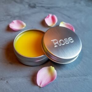 a photograph of a lip balm in a brushed  yAP2aZ83Q0m0PT69BeD7dg UsDOWD8FSy6wHxzcu1CfBQ